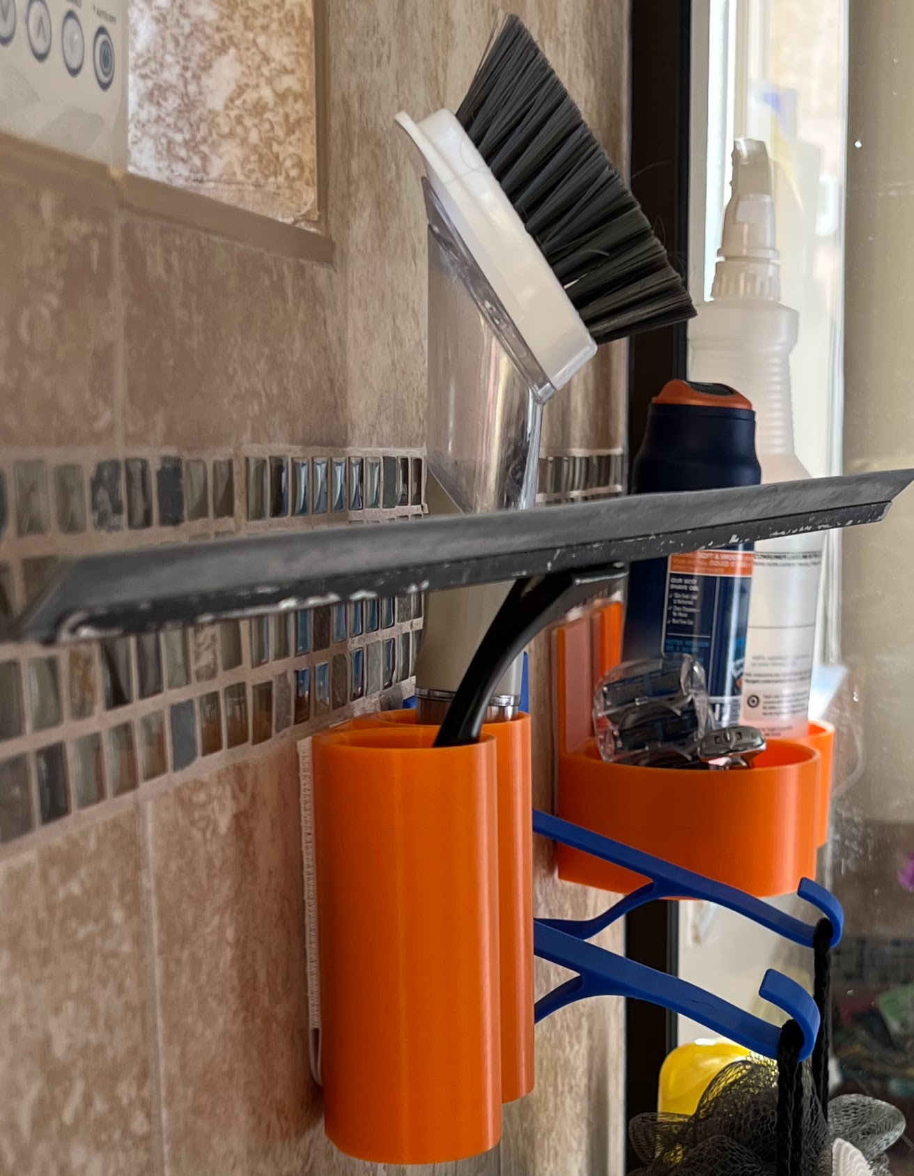 Photograph of functional 3D printed double cylinder shower wall holder